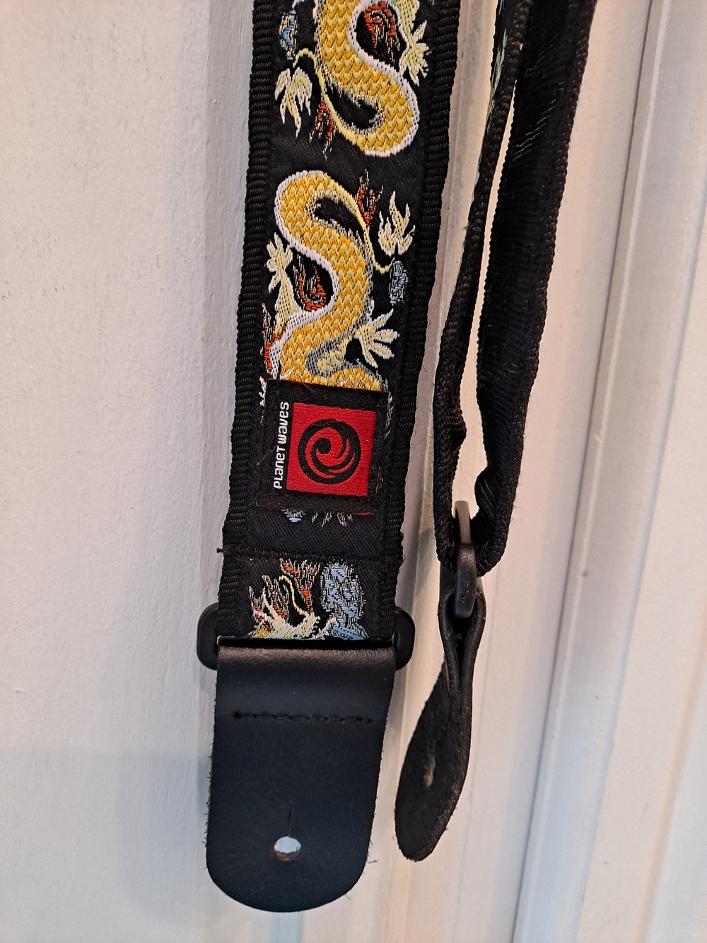 Planet Waves Black Guitar Strap with Yellow Dragon Embroidery